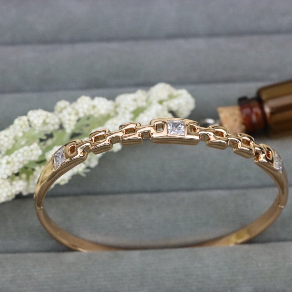 Elegant Rose Gold Bangle with Geometric Charm and Crystal Accents, XPBL0474
